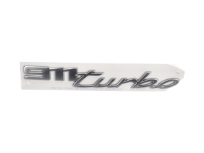 Rear badge - 911 turbo - in Silver. Porsche 992 Turbo - 992853675DOU2